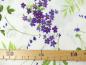 Preview: Patchworkstoff Clothworks aus der Serie Flowershop weiß lila Blüten mit Maß